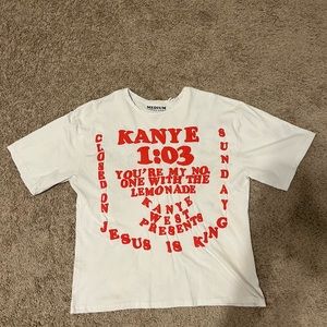 A white puff print Kanye Jesus shirt